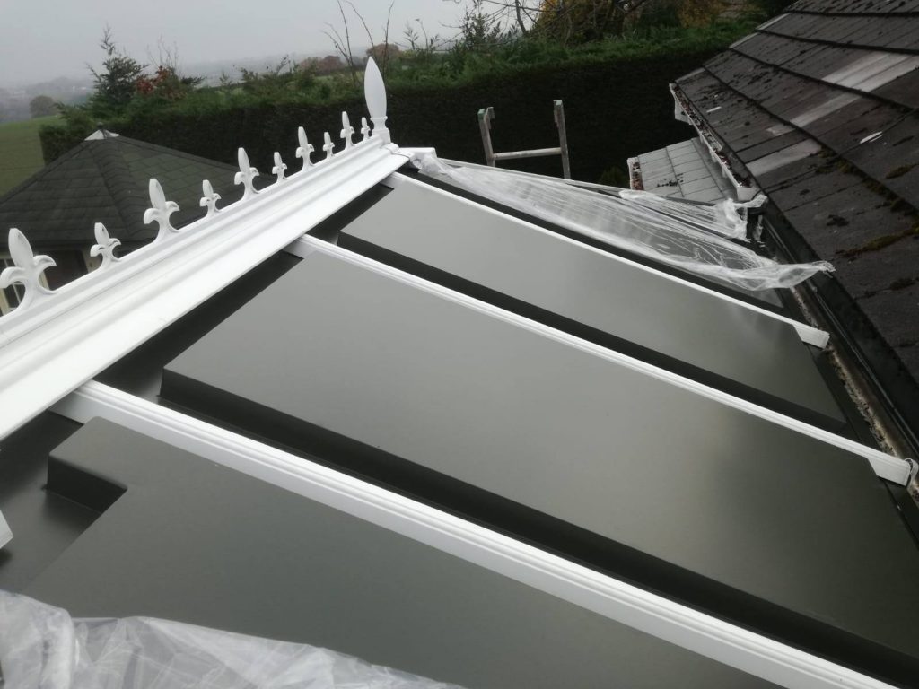 white and grey conservatory roof panels