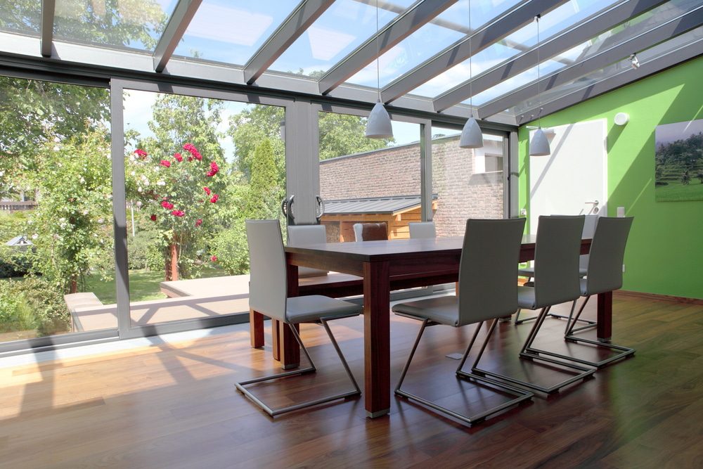 lean-to conservatory refurbishment showing an aluminium conservatory looking at the garden